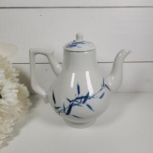 Vintage Chinese White and Blue Porcelain Tea Pot. Hand painted bamboo design on